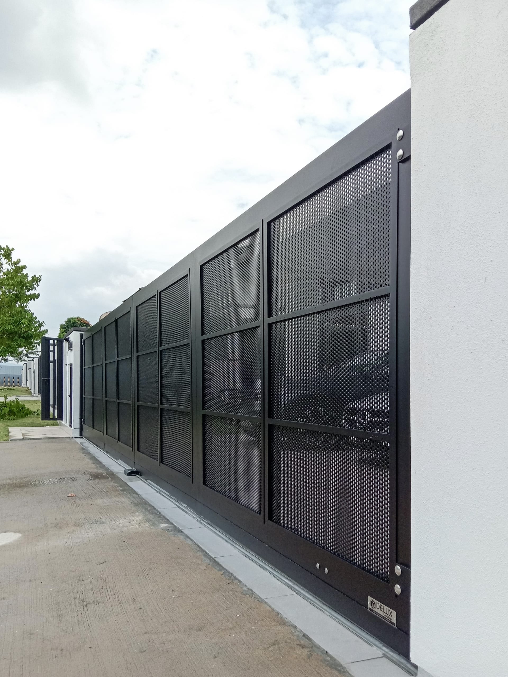 Trackless folding gate Trackless autogate Folding gate Malaysia Aluminium gate Malaysia Delux autogate Unigate Autogate Malaysia Unigate Malaysia Trackless gate Malaysia Aluminium gate supplier Malaysia Aluminium auto gate Autogate price Autogate system price Trackless autogate malaysia price Autogate malaysia price Aluminium gate suppliers x7