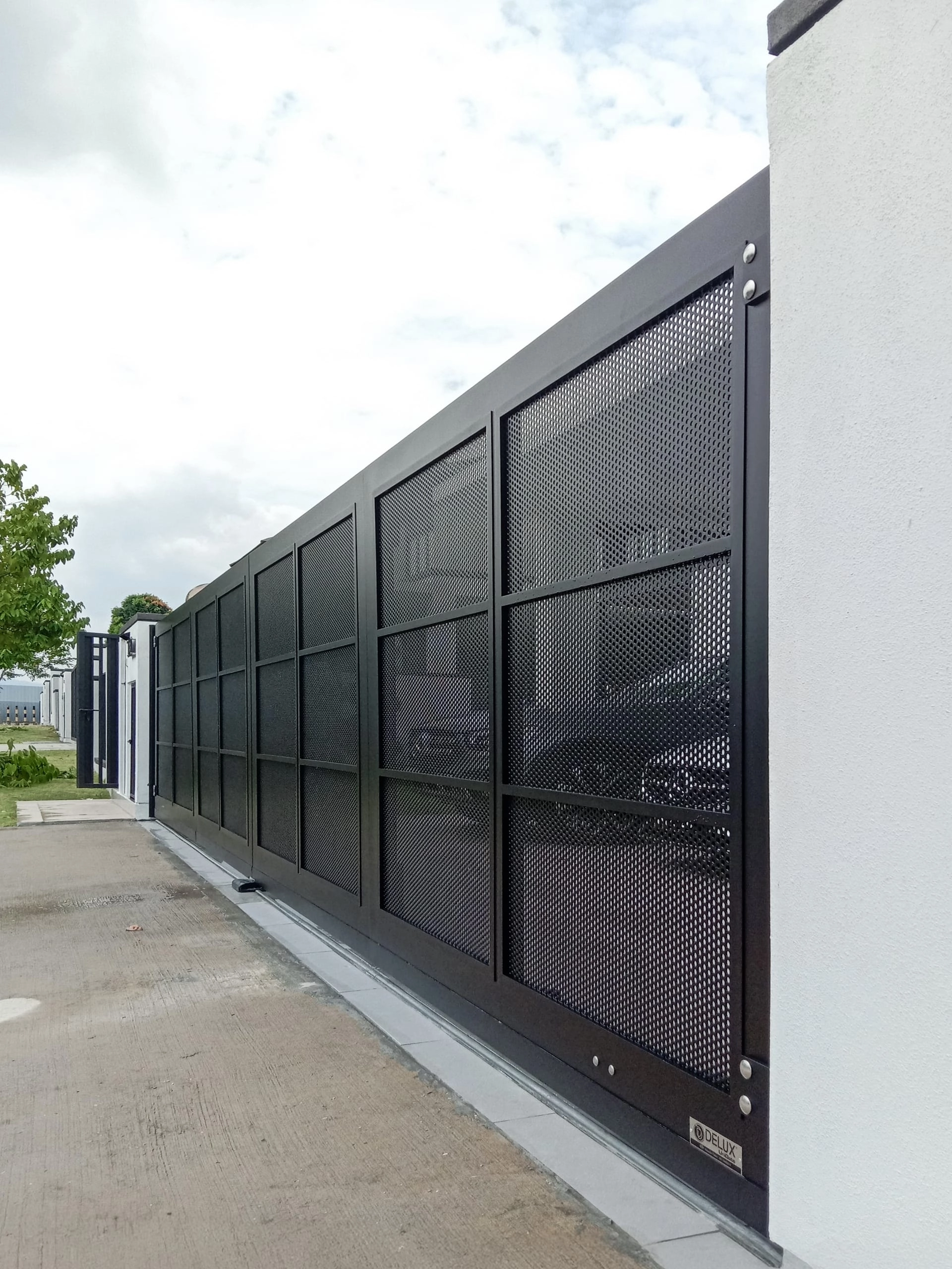 Trackless folding gate Trackless autogate Folding gate Malaysia Aluminium gate Malaysia Delux autogate Unigate Autogate Malaysia Unigate Malaysia Trackless gate Malaysia Aluminium gate supplier Malaysia Aluminium auto gate Autogate price Autogate system price Trackless autogate malaysia price Autogate malaysia price Aluminium gate suppliers x7