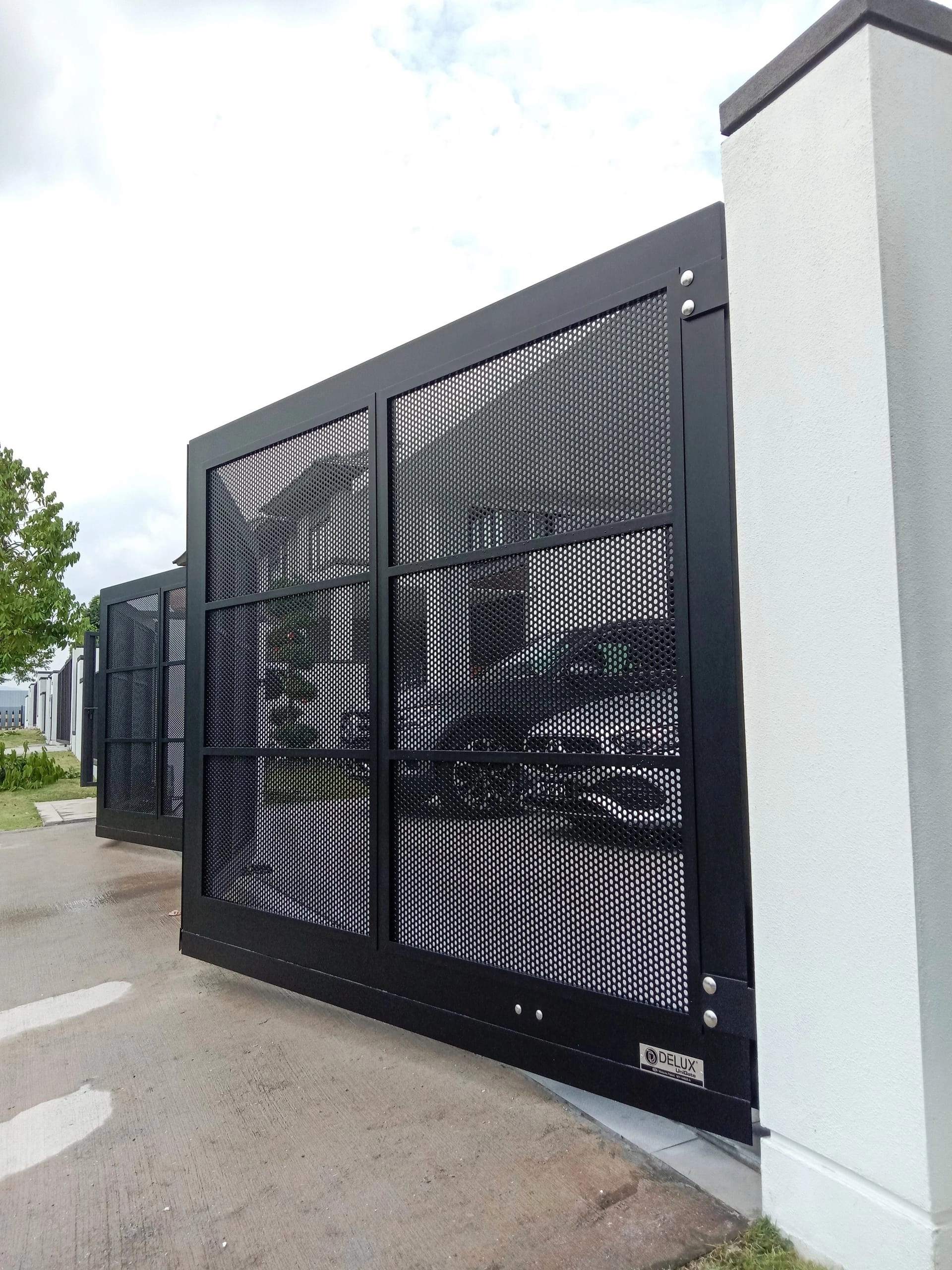 Trackless folding gate Trackless autogate Folding gate Malaysia Aluminium gate Malaysia Delux autogate Unigate Autogate Malaysia Unigate Malaysia Trackless gate Malaysia Aluminium gate supplier Malaysia Aluminium auto gate Autogate price Autogate system price Trackless autogate malaysia price Autogate malaysia price Aluminium gate suppliers x7