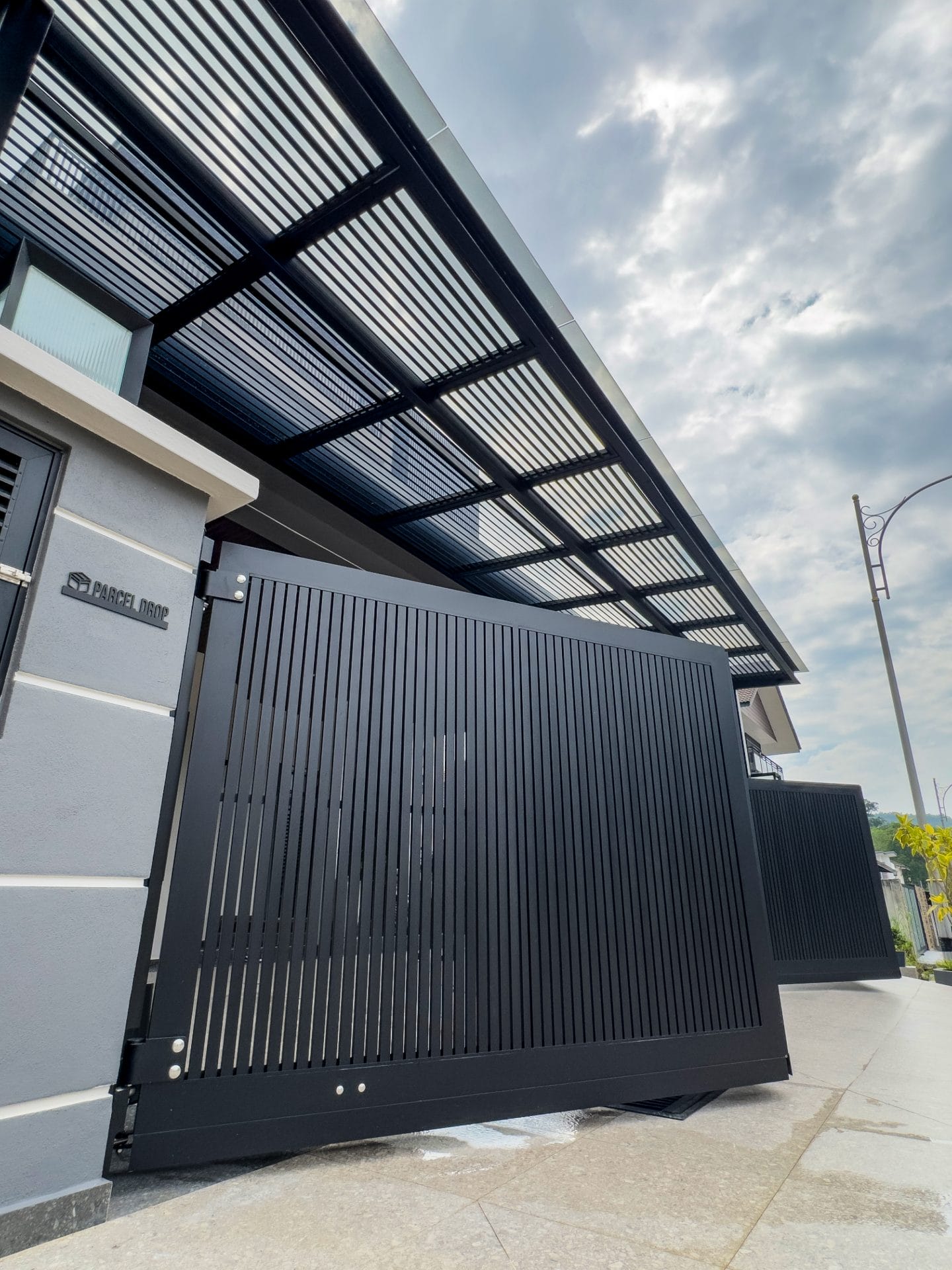 Trackless folding gate Trackless autogate Folding gate Malaysia Aluminium gate Malaysia Delux autogate Unigate Autogate Malaysia Unigate Malaysia Trackless gate Malaysia Aluminium gate supplier Malaysia Aluminium auto gate Autogate price Autogate system price Trackless autogate malaysia price Autogate malaysia price Aluminium gate suppliers texstone x16